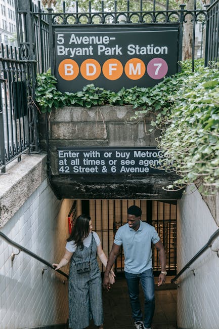 Couple at subway entrance representing urban commuter and travel protection